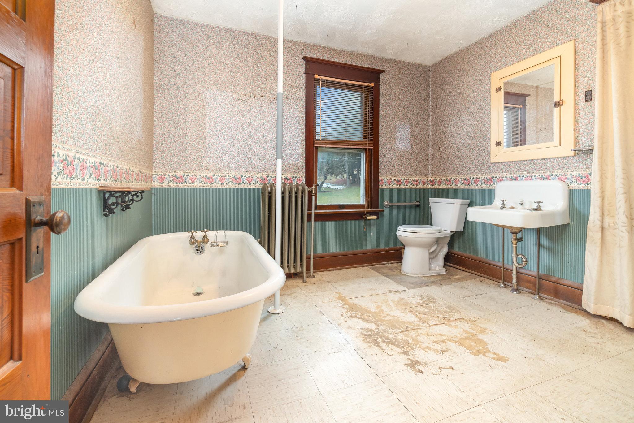 770 Main Street Lykens, PA 17048 - Photo 20 of 26 a bathroom with a sink and a toilet