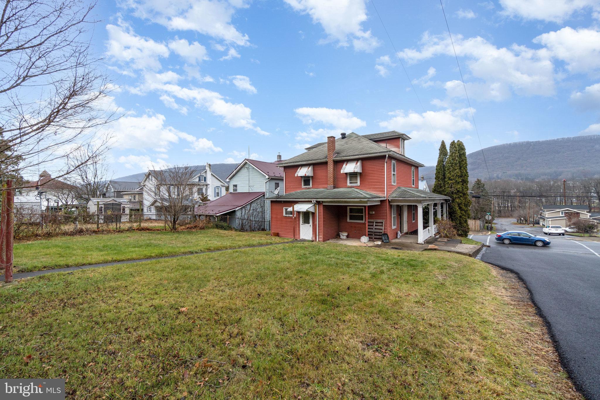 770 Main Street Lykens, PA 17048 - Photo 24 of 26 a view of a big house with a big yard and large trees