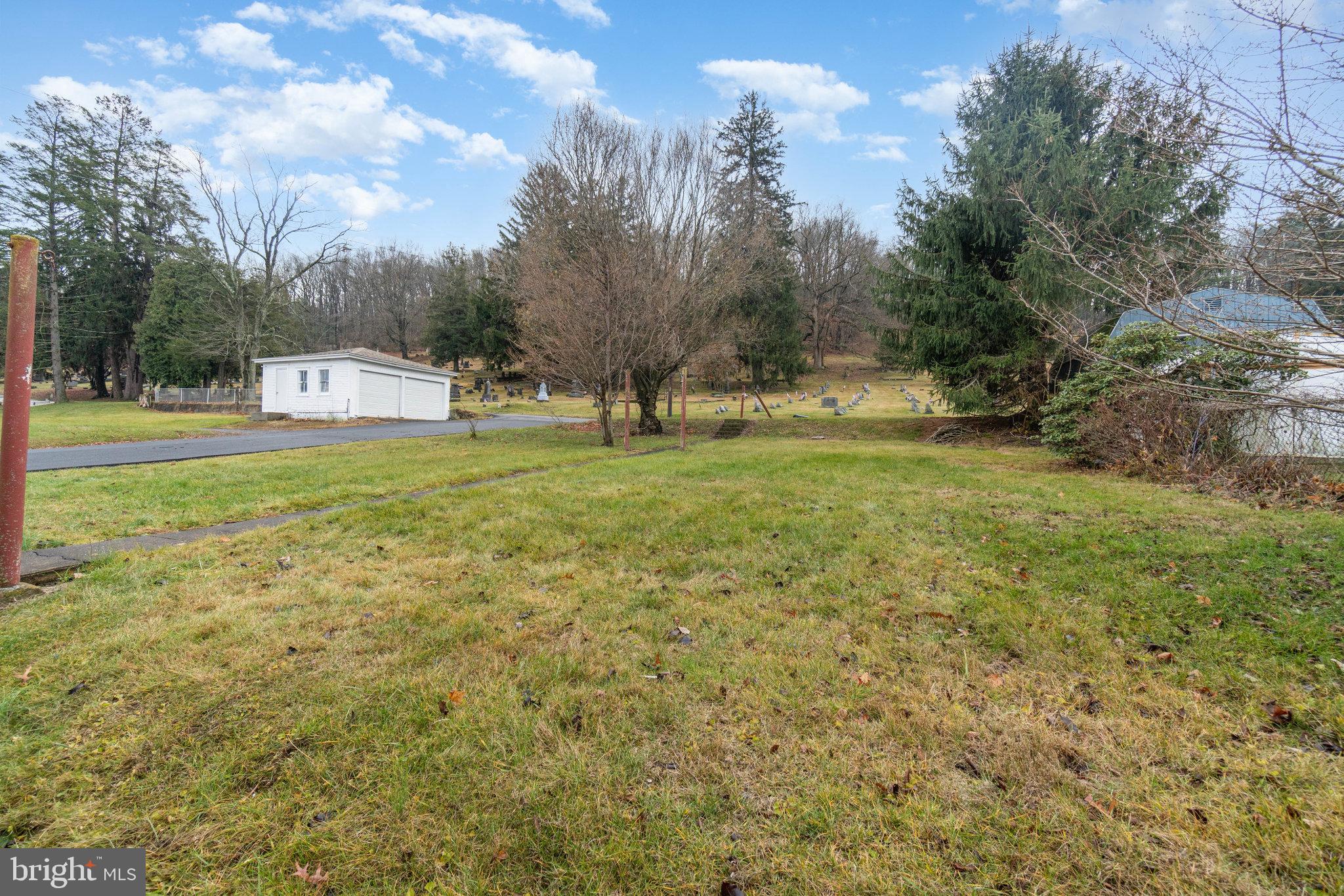 770 Main Street Lykens, PA 17048 - Photo 26 of 26 a view of a big yard with a fountain