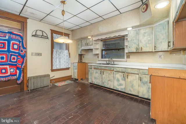 a view of a livingroom with wooden floor