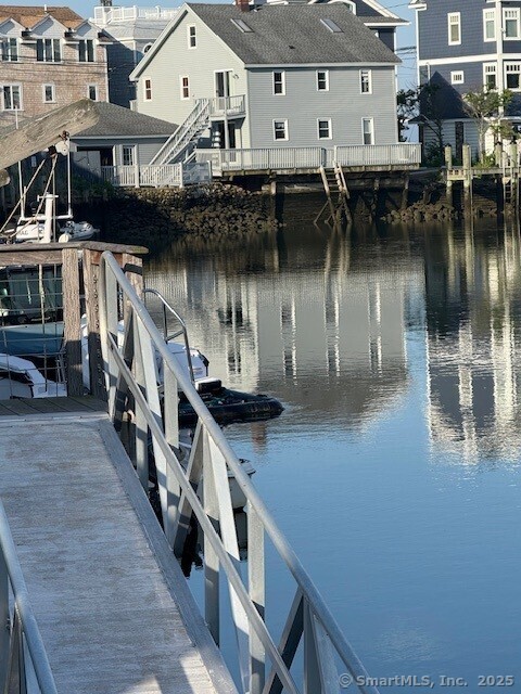 2142 Fairfield Beach Road Fairfield, CT 06824 - Photo 2 of 39 a city view with a lake view