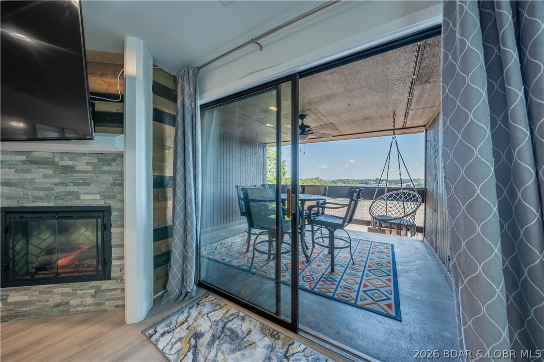 5940 Baydy Peak Road, Unit 1123 Osage Beach, MO 65065 - Photo 1 of 36 Spacious and open Living Room with Lake View
