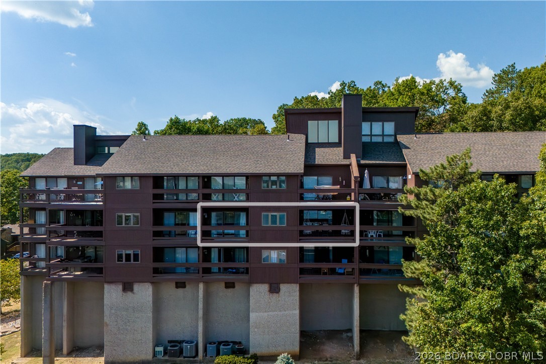 5940 Baydy Peak Road, Unit 1123 Osage Beach, MO 65065 - Photo 25 of 36 View of the Complex from the Lake