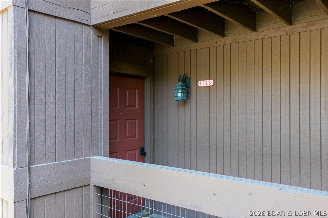 5940 Baydy Peak Road, Unit 1123 Osage Beach, MO 65065 - Photo 28 of 36 Front Door