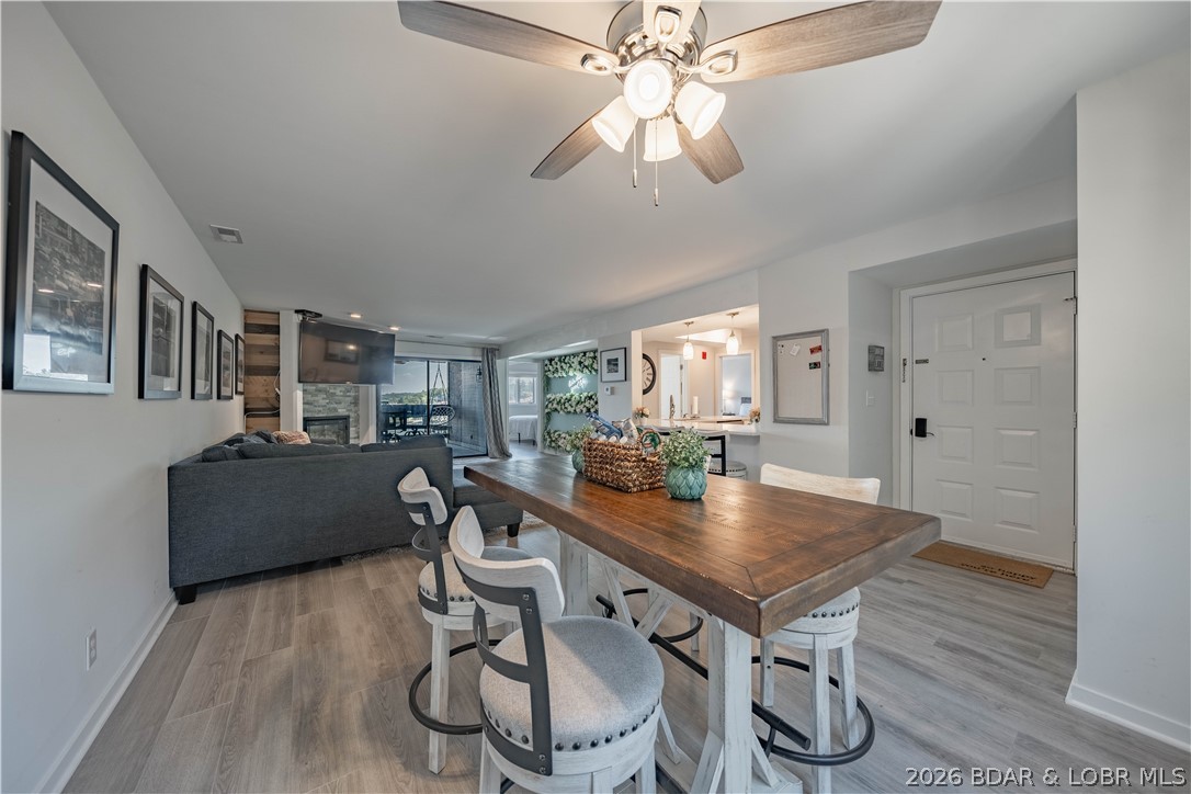 5940 Baydy Peak Road, Unit 1123 Osage Beach, MO 65065 - Photo 6 of 36 Dining Area and Living Room