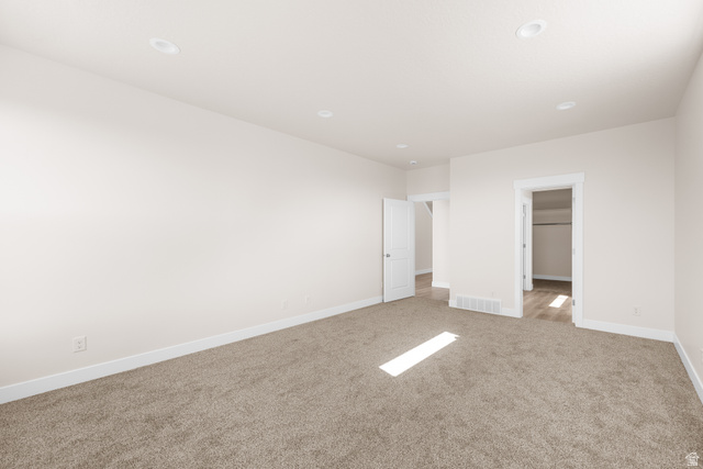 1510 West 600 North, Unit GE 04 Mapleton, UT 84664 - Photo 13 of 21 Spacious room with plush carpeting, recessed lighting, white trim, and light-toned walls