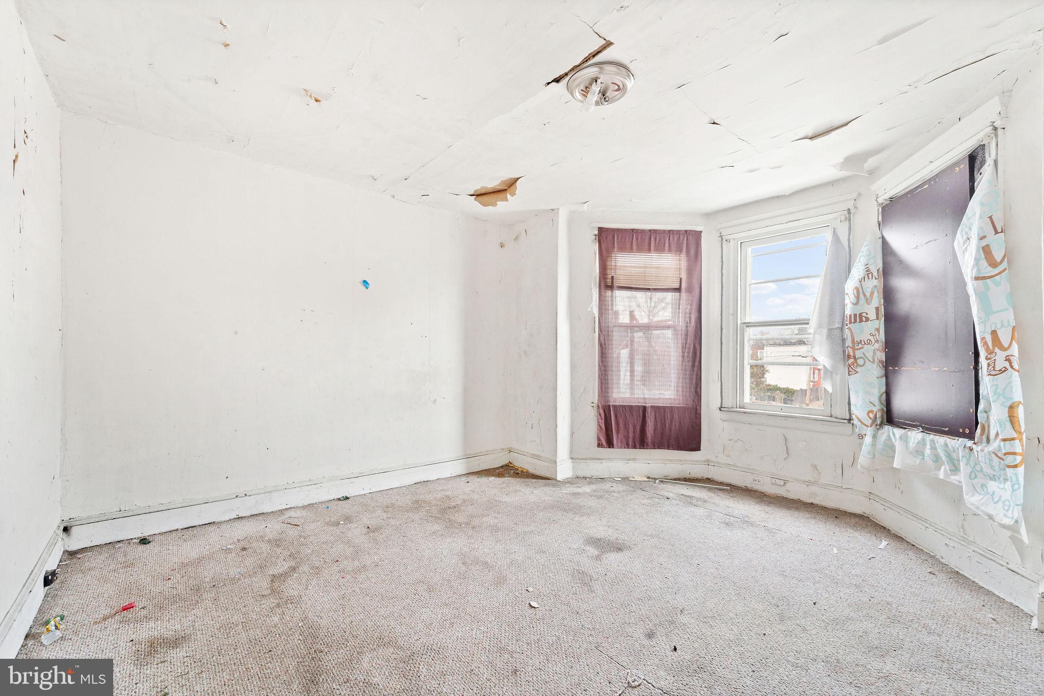 1401 Princess Avenue Camden, NJ 08103 - Photo 18 of 25 a view of an empty room with a fireplace