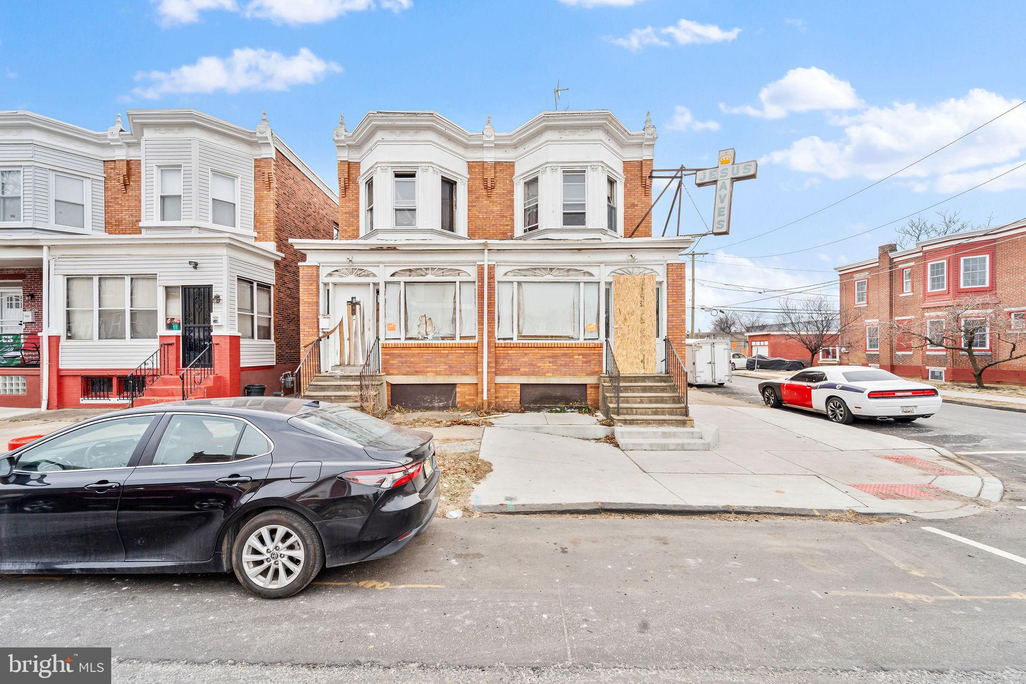 1401 Princess Avenue Camden, NJ 08103 - Photo 2 of 25 a front view of a house with parking space
