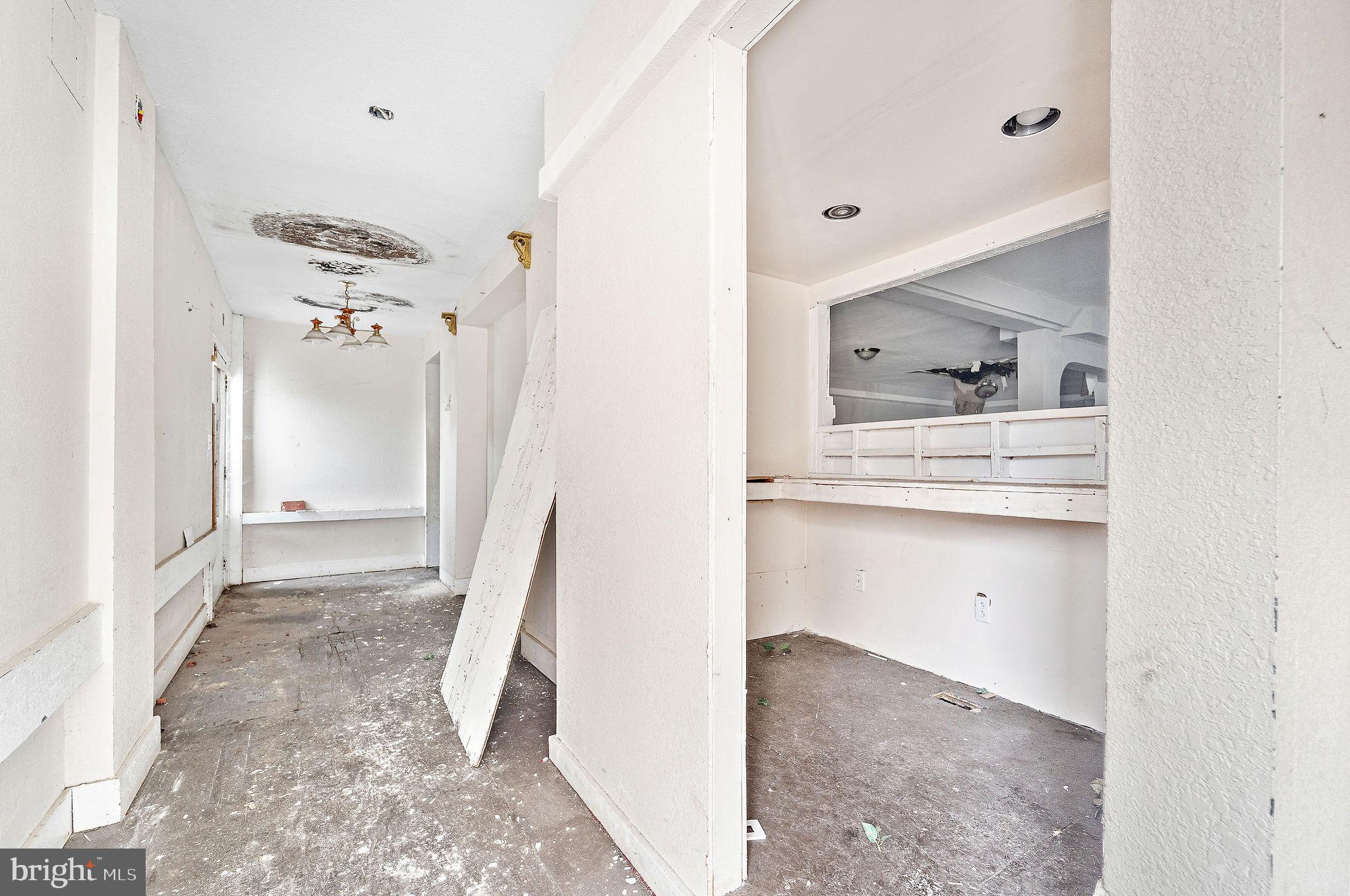 1401 Princess Avenue Camden, NJ 08103 - Photo 5 of 25 a bathroom with a bathtub sink and mirror