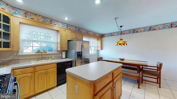 a kitchen that has a cabinets and a stove