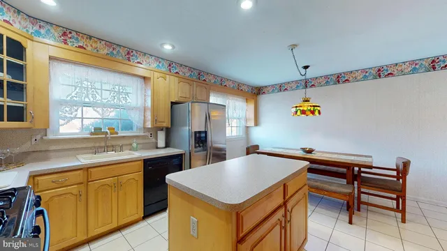 a kitchen that has a cabinets and a stove