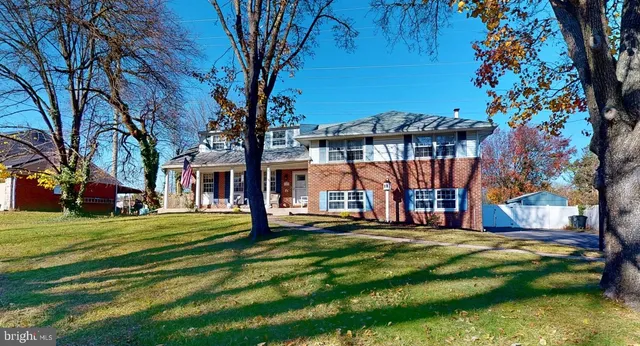 a view of a building with a big yard