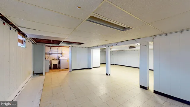 a front view of house with yard and outdoor seating