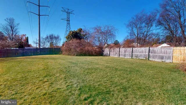 a view of a house with a street