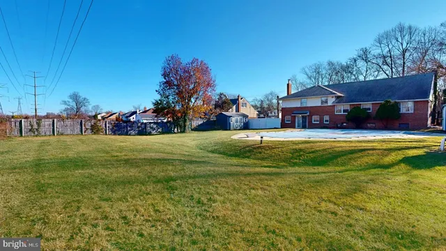 a view of a house with a big yard