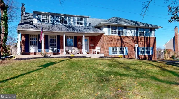 a view of a building with a yard