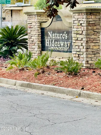 a sign on the side of a road