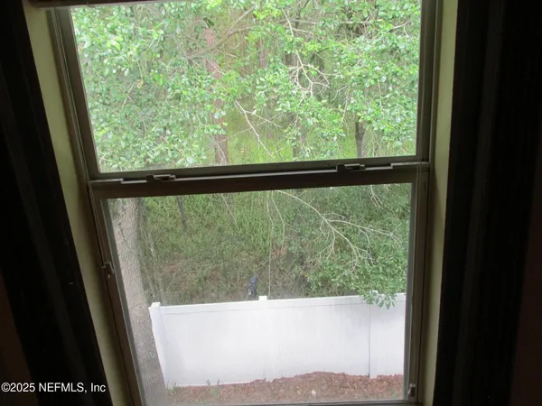 a view of large windows in a room