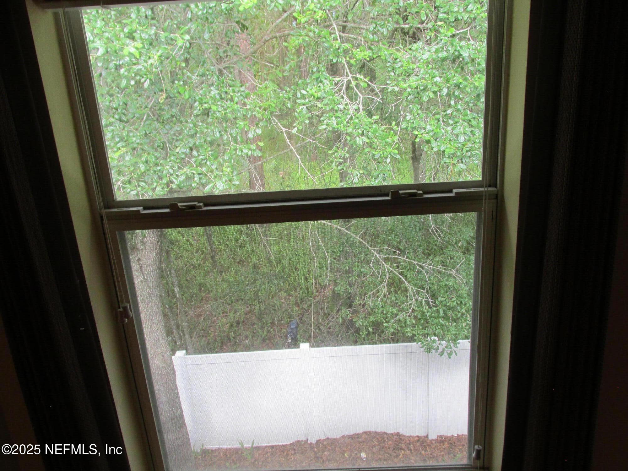 6057 Maggies Circle, Unit 114 Jacksonville, FL 32244 - Photo 16 of 28 Views from Secondar Bedroom