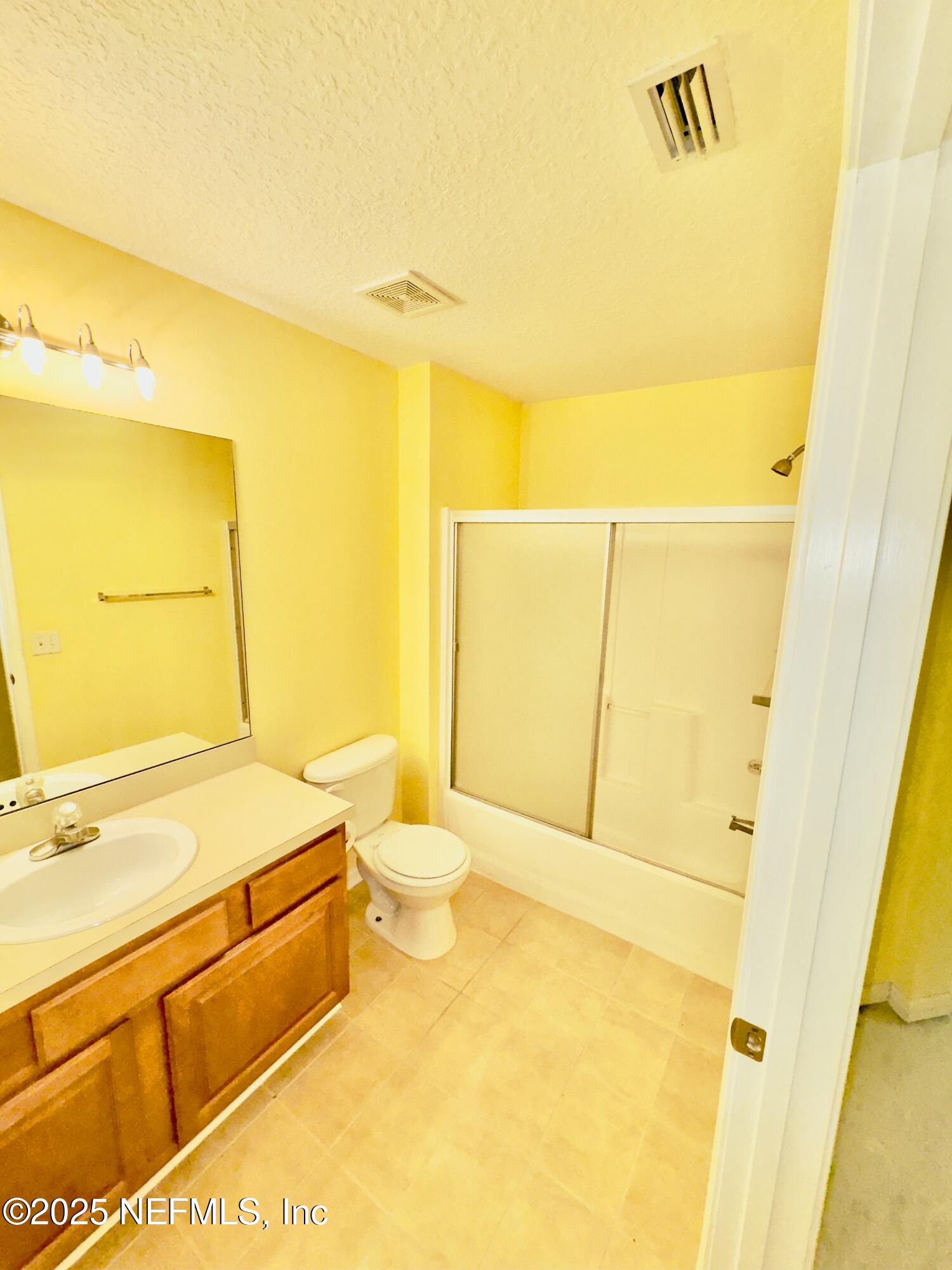 6057 Maggies Circle, Unit 114 Jacksonville, FL 32244 - Photo 17 of 28 a bathroom with a sink and a toilet