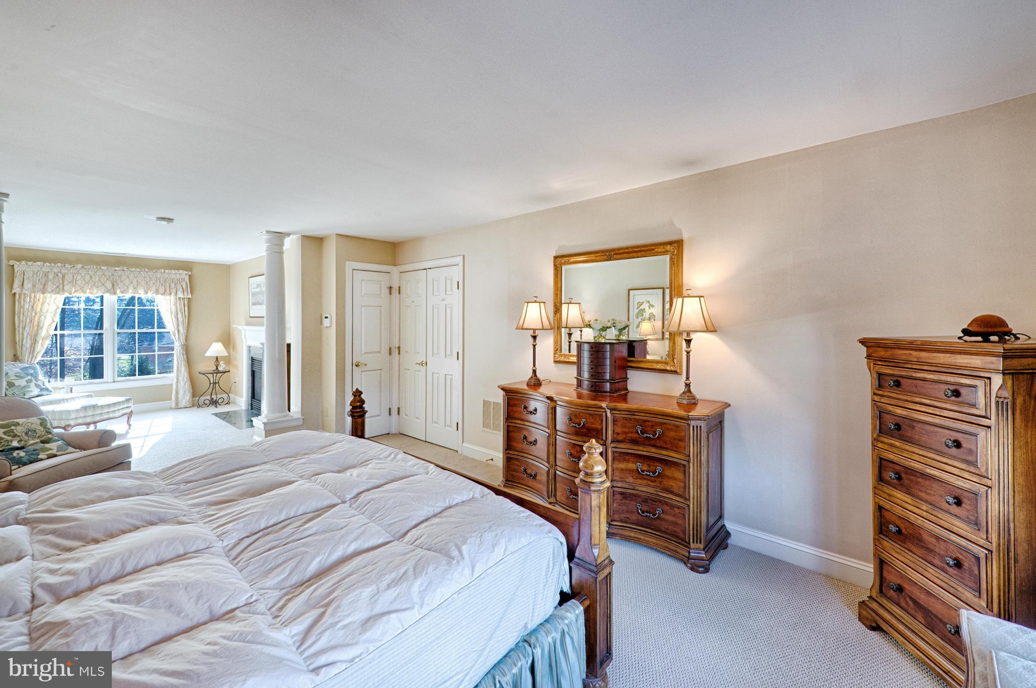 1629 Providence Road Towson, MD 21286 - Photo 14 of 30 a bedroom with a bed and a television