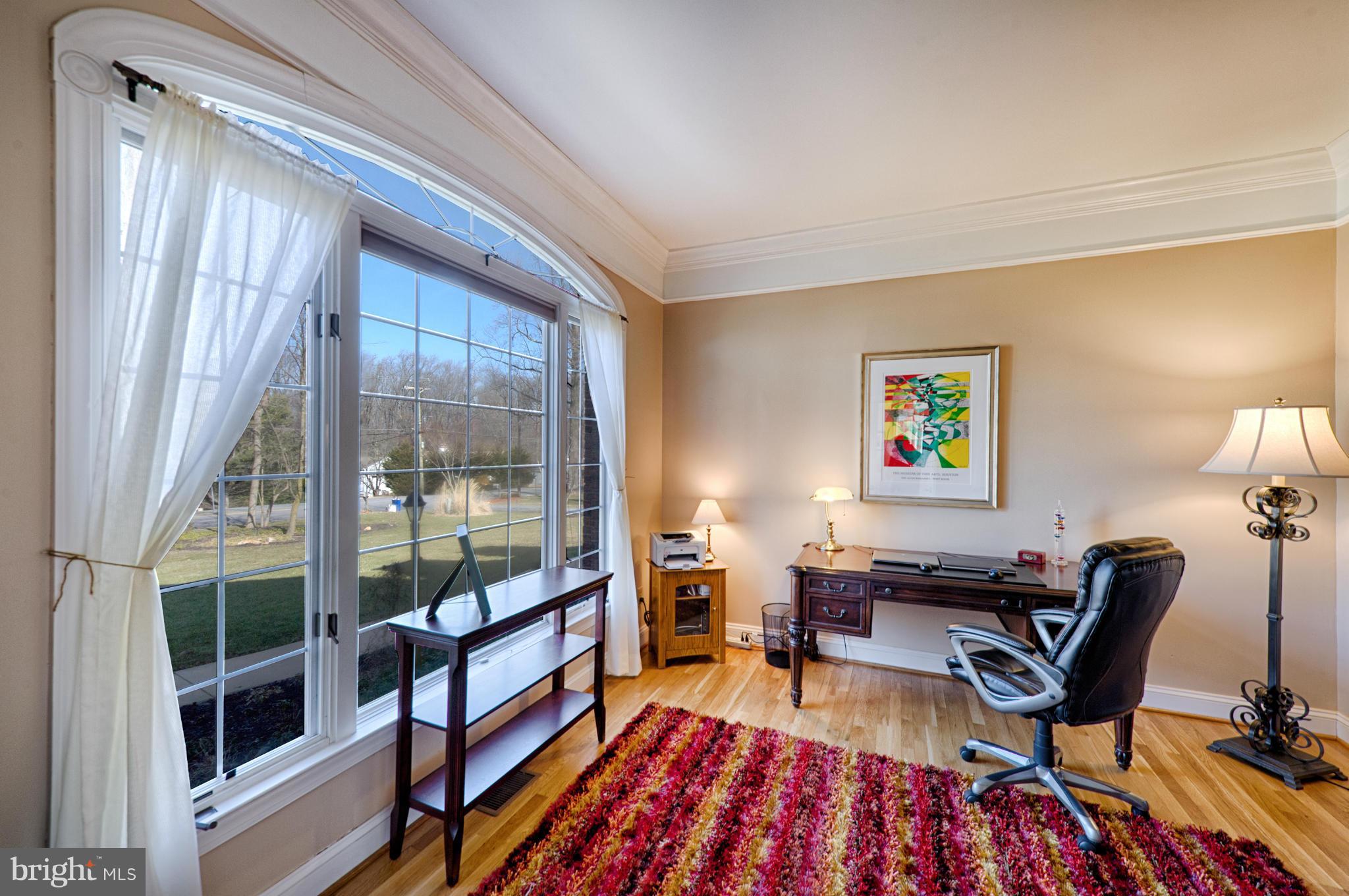 1629 Providence Road Towson, MD 21286 - Photo 20 of 30 a workspace with furniture and a window
