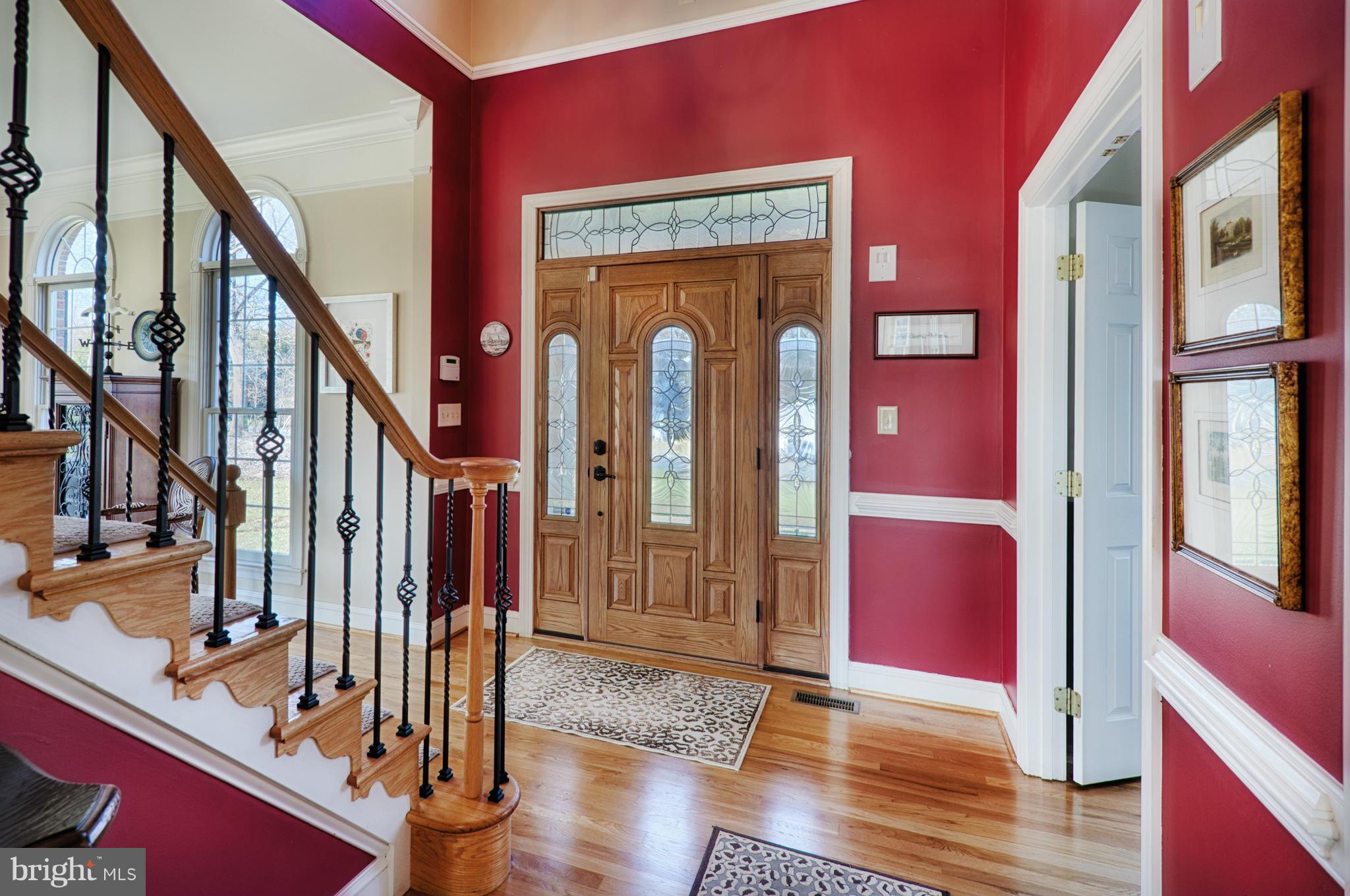 1629 Providence Road Towson, MD 21286 - Photo 21 of 30 a view of an entryway with wooden floor and door