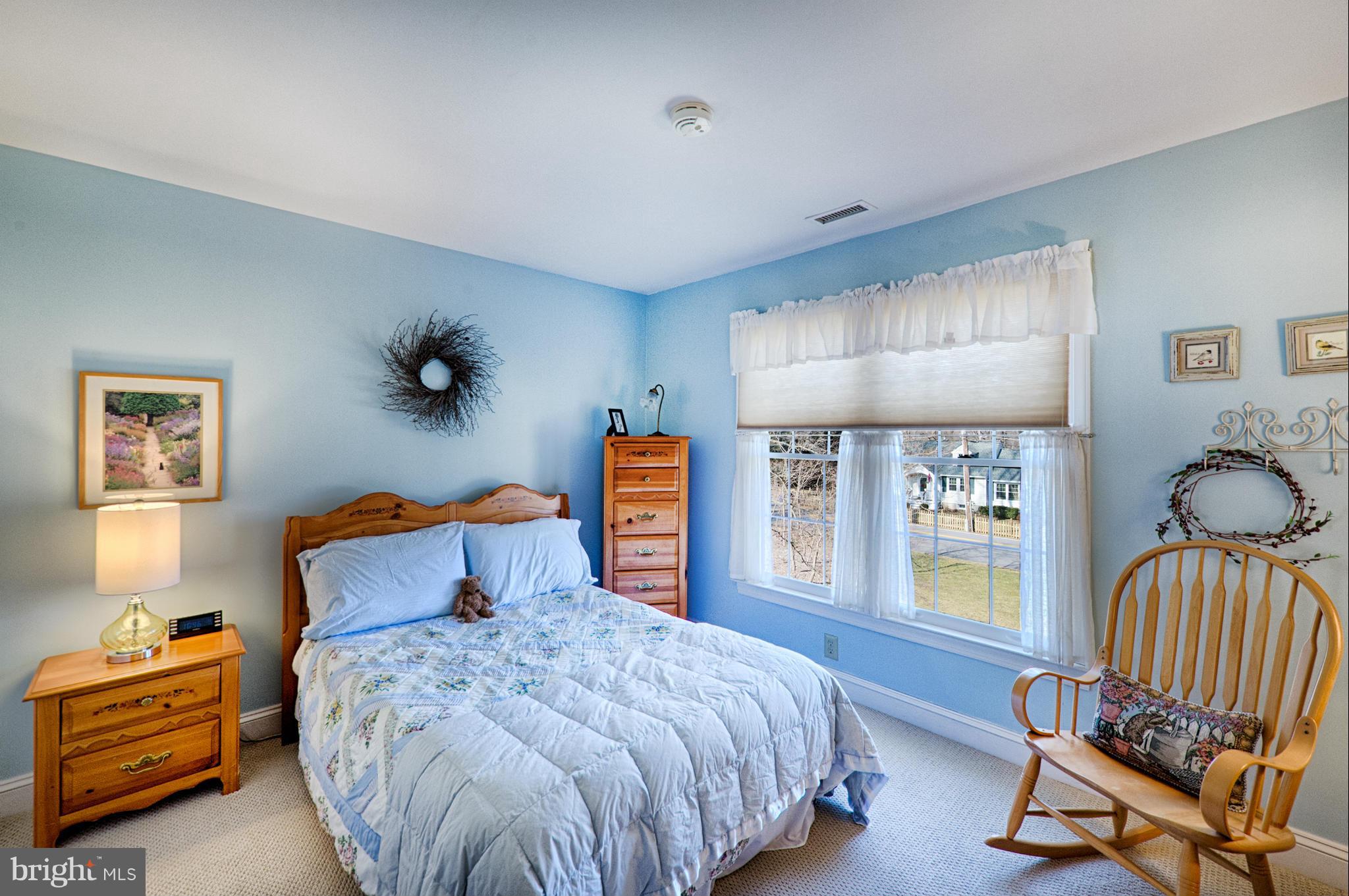 1629 Providence Road Towson, MD 21286 - Photo 22 of 30 a bedroom with a bed and wooden floor