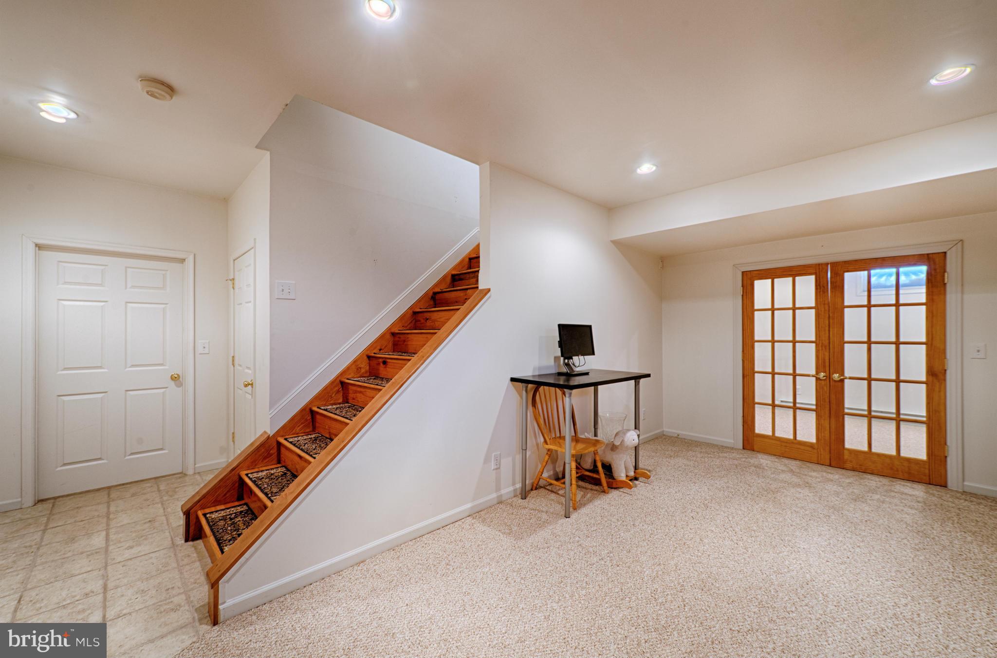 1629 Providence Road Towson, MD 21286 - Photo 25 of 30 a room with furniture and stairs