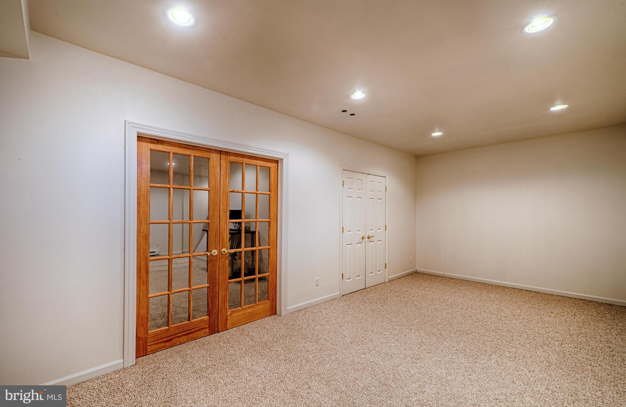1629 Providence Road Towson, MD 21286 - Photo 26 of 30 an empty room with a empty space and windows