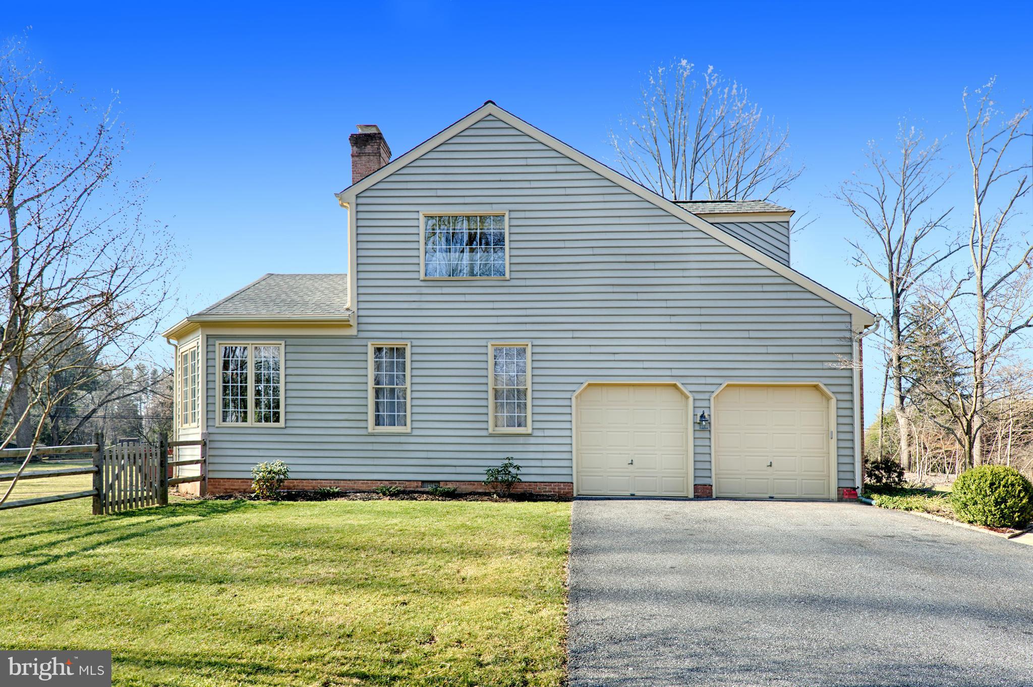 1629 Providence Road Towson, MD 21286 - Photo 30 of 30 a front view of a house with a garden