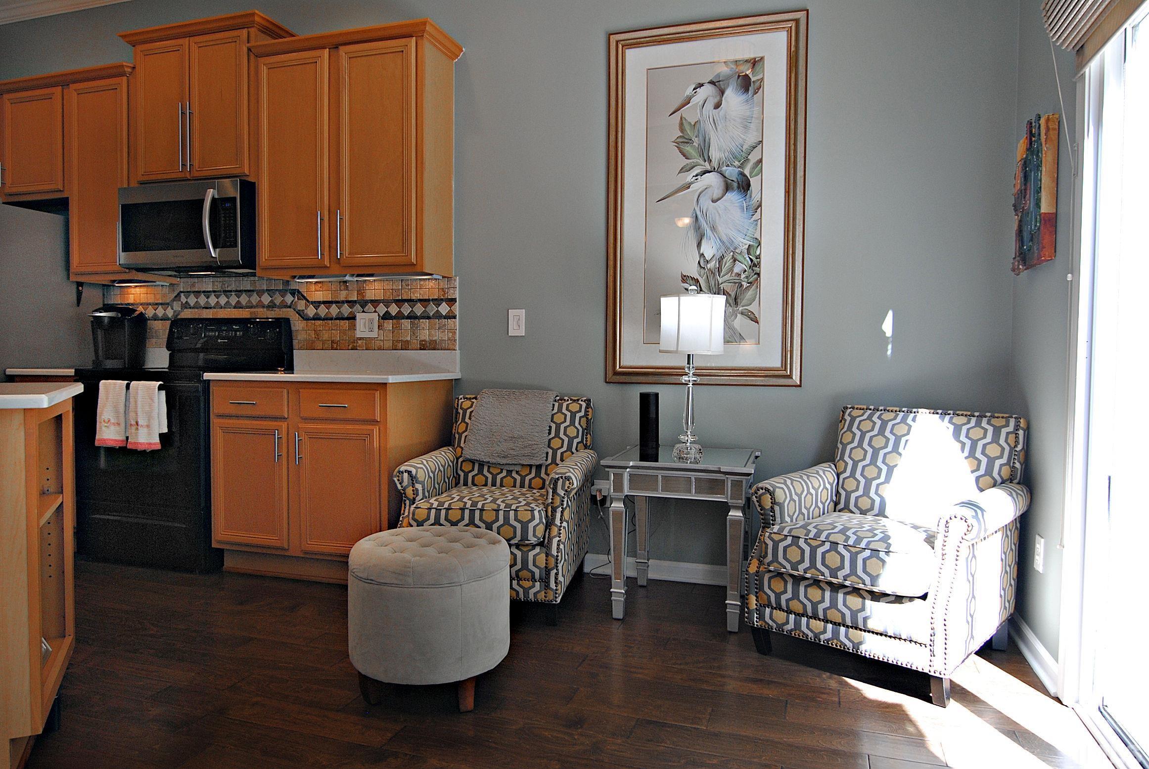 13222 Ashford Park Drive Raleigh, NC 27613 - Photo 14 of 30 a living room with furniture a flat screen tv and a window