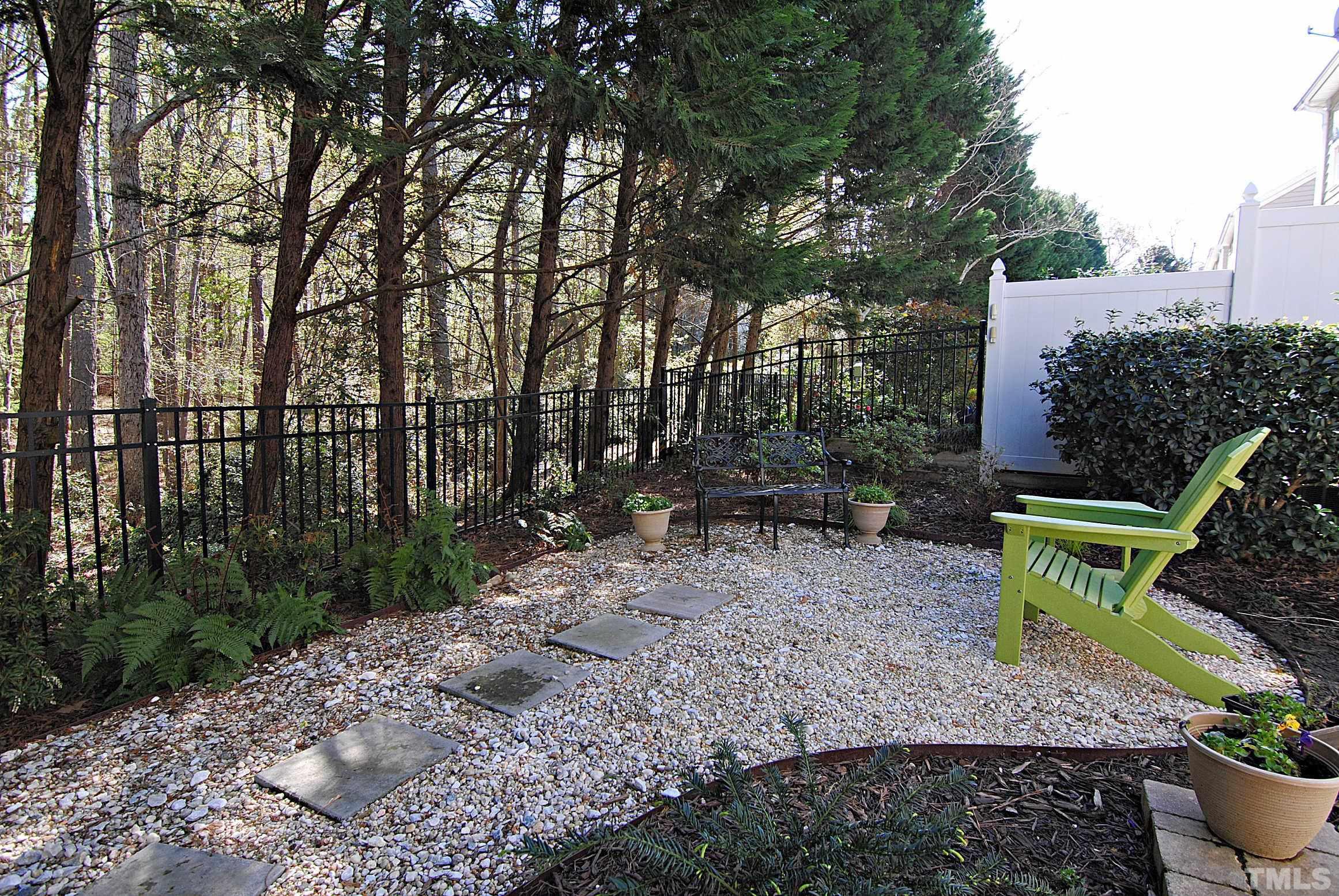 13222 Ashford Park Drive Raleigh, NC 27613 - Photo 26 of 30 a view of a backyard with sitting area