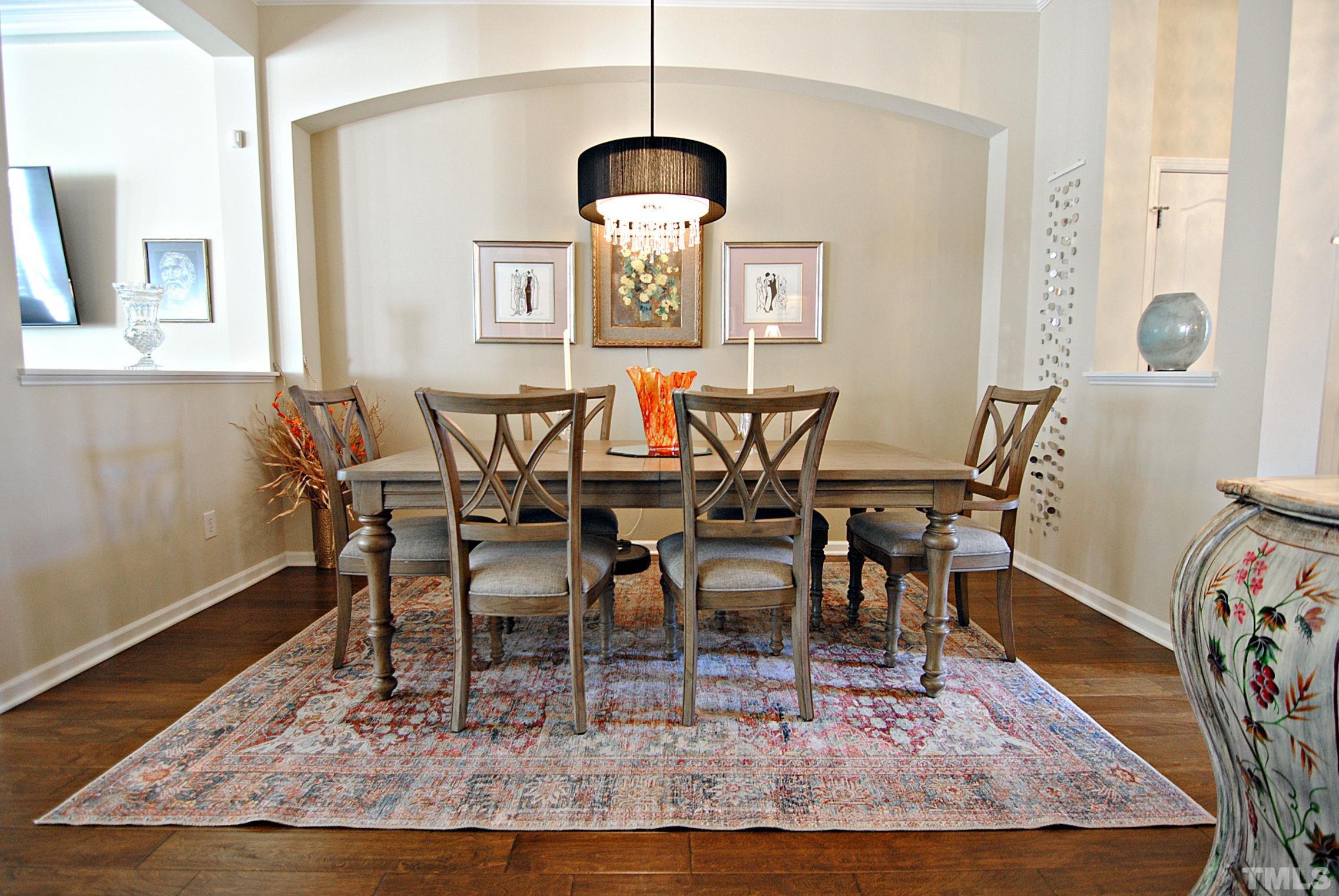 13222 Ashford Park Drive Raleigh, NC 27613 - Photo 4 of 30 a view of a dining room with furniture