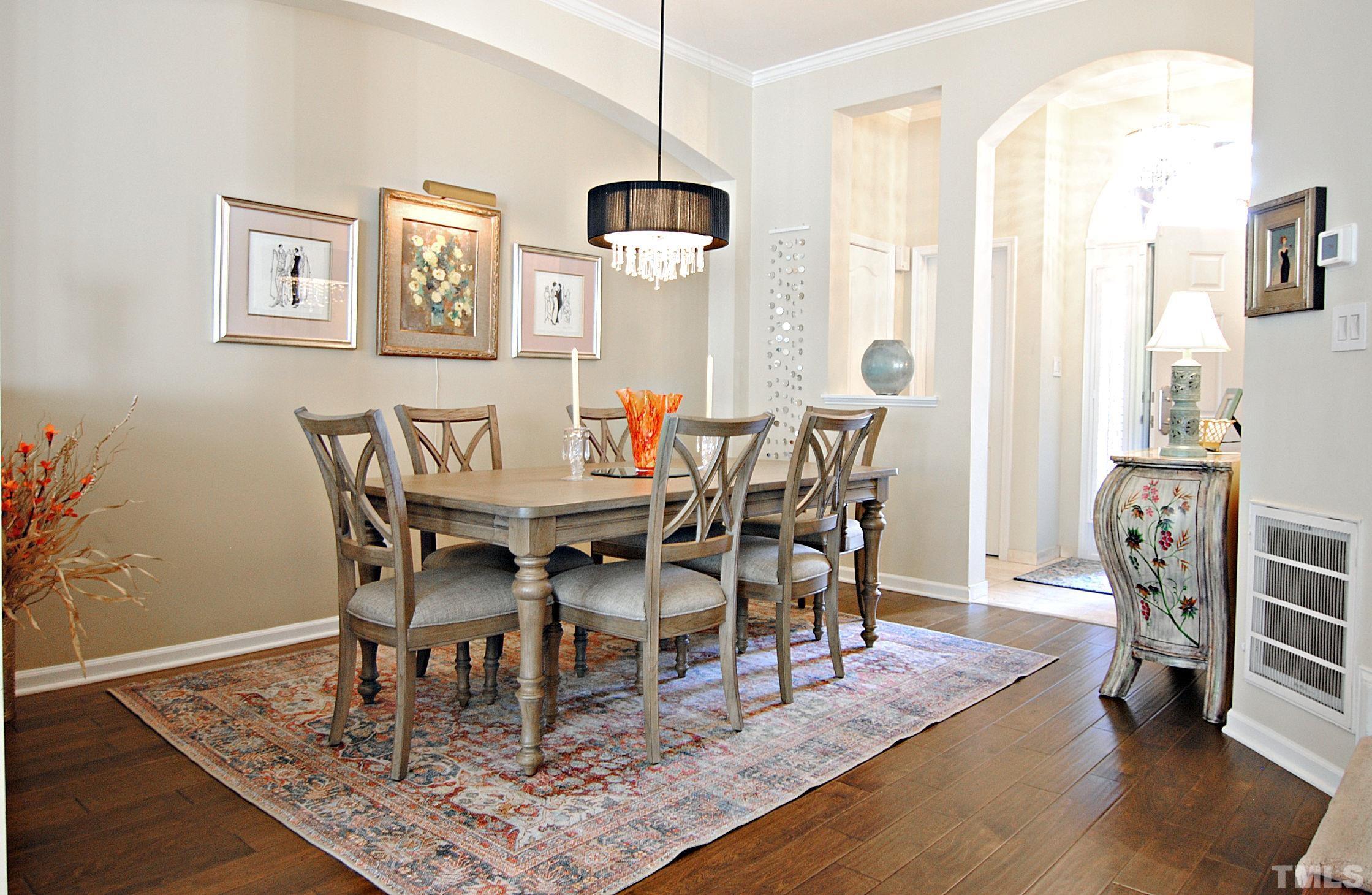 13222 Ashford Park Drive Raleigh, NC 27613 - Photo 5 of 30 a view of a dining room with furniture