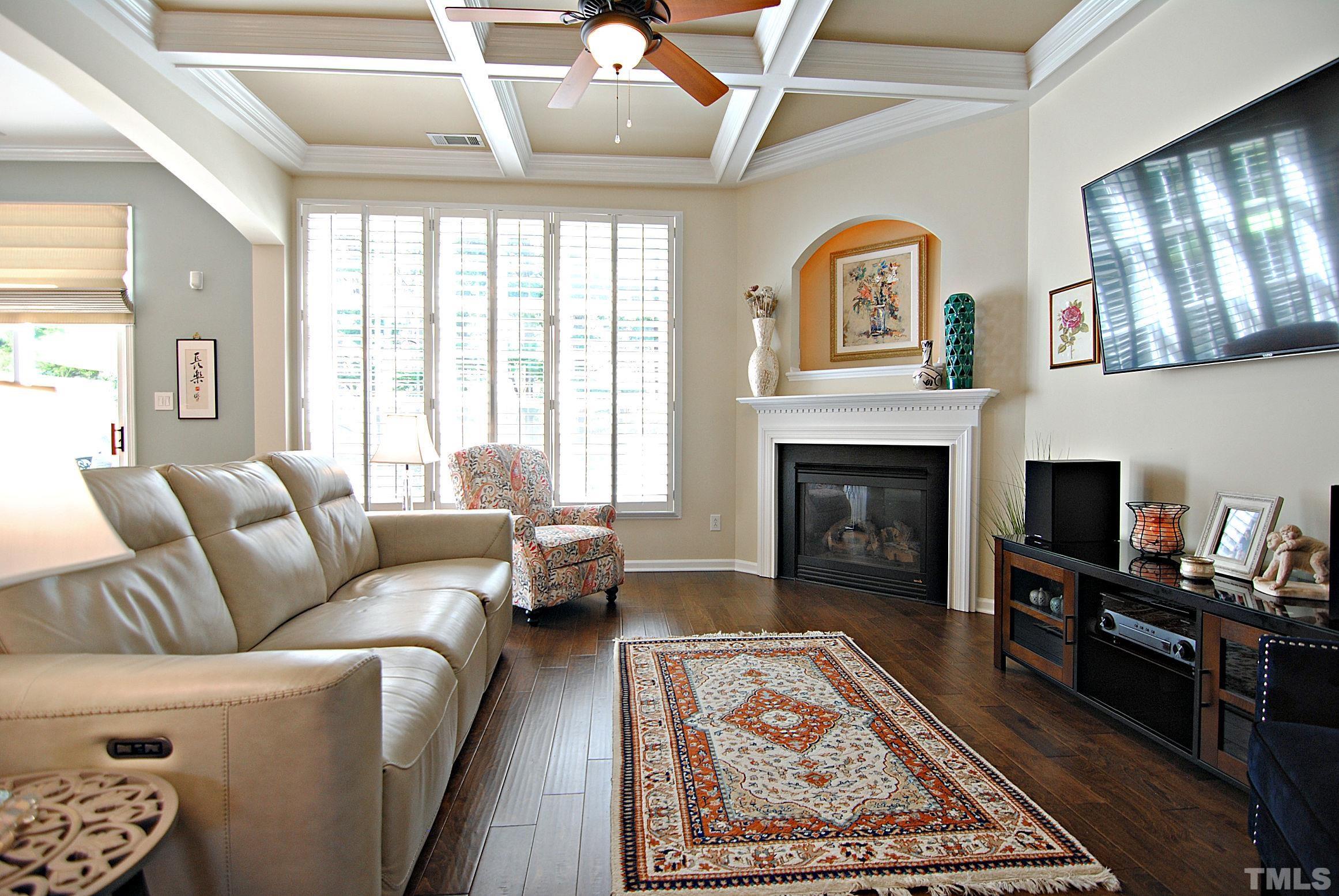 13222 Ashford Park Drive Raleigh, NC 27613 - Photo 9 of 30 a living room with furniture fireplace and flat screen tv