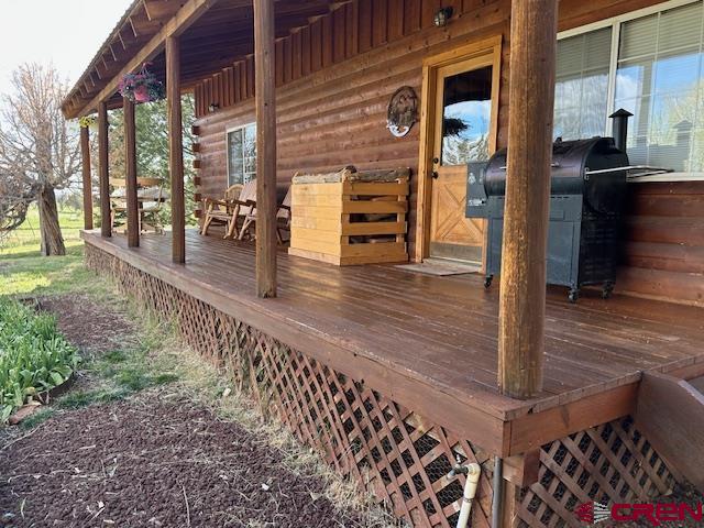 21330 Rd V.6 Lewis, CO 81327 - Photo 17 of 30 a view of a porch with a door