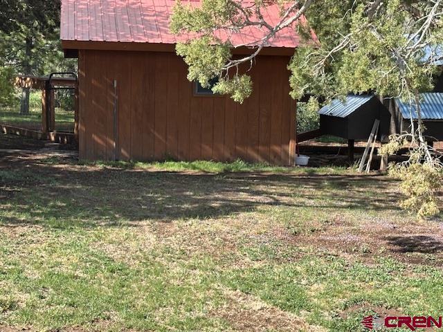 21330 Rd V.6 Lewis, CO 81327 - Photo 23 of 30 a backyard of a house