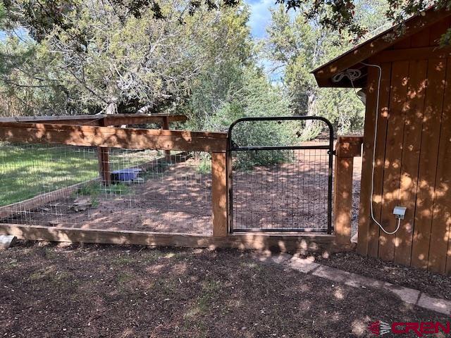 21330 Rd V.6 Lewis, CO 81327 - Photo 28 of 30 a backyard of a house with lots of green space