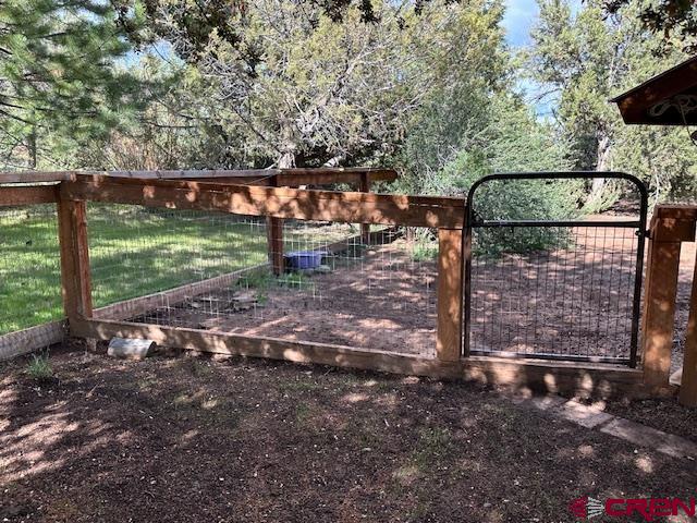 21330 Rd V.6 Lewis, CO 81327 - Photo 29 of 30 a backyard of a house with lots of green space