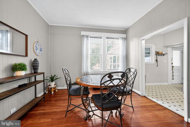 a kitchen with stainless steel appliances a stove and a refrigerator
