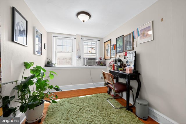 a kitchen with stainless steel appliances a stove a sink and a microwave