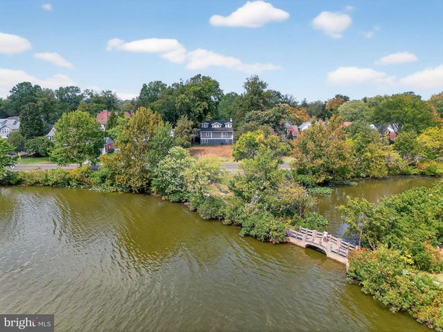 an aerial view of a city with lake view