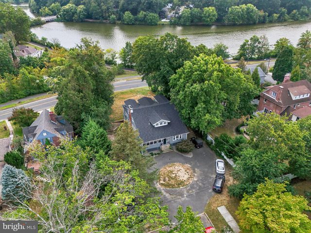 a outdoor space with patio the couches and a dining table with garden view
