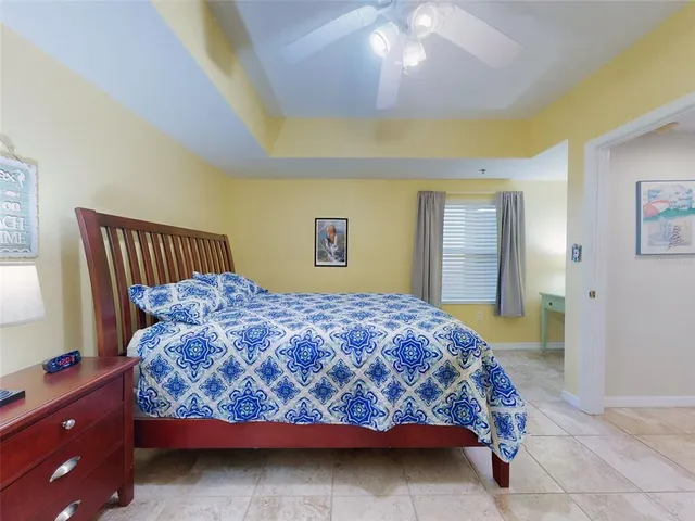 a view of a a dining room with furniture window and wooden floor