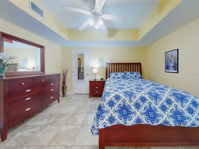 a living room with fireplace furniture and a flat screen tv