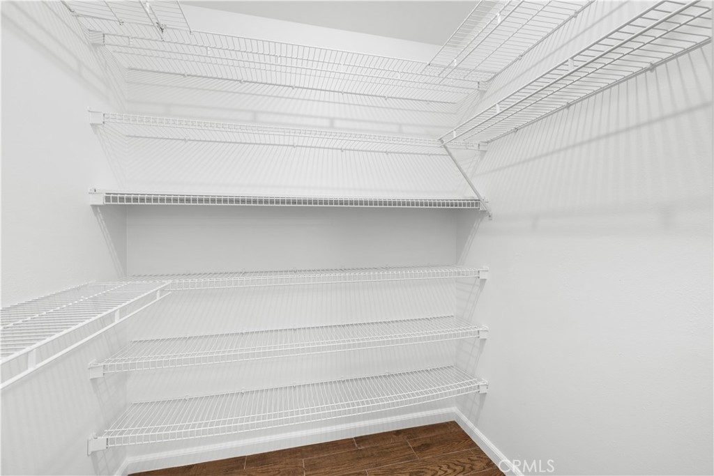 26096 Adamor Road Calabasas, CA 91302 - Photo 40 of 61 Bedroom #2 walk-in closet with automatic light.