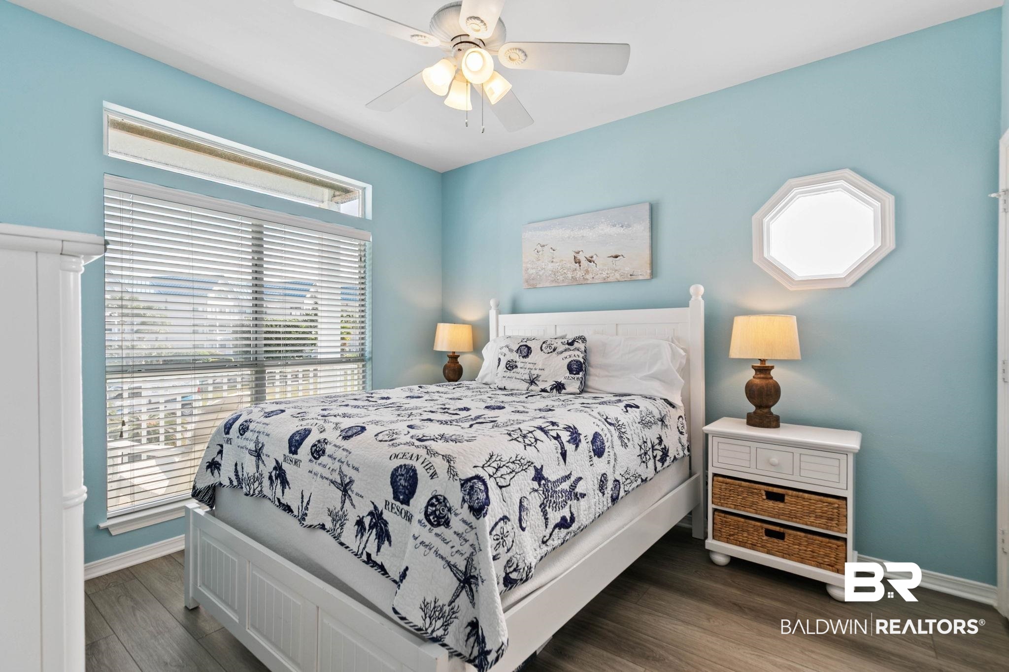 545 Plantation Road, Unit 3 Gulf Shores, AL 36542 - Photo 20 of 54 Bedroom featuring wood finished floors and a ceiling fan