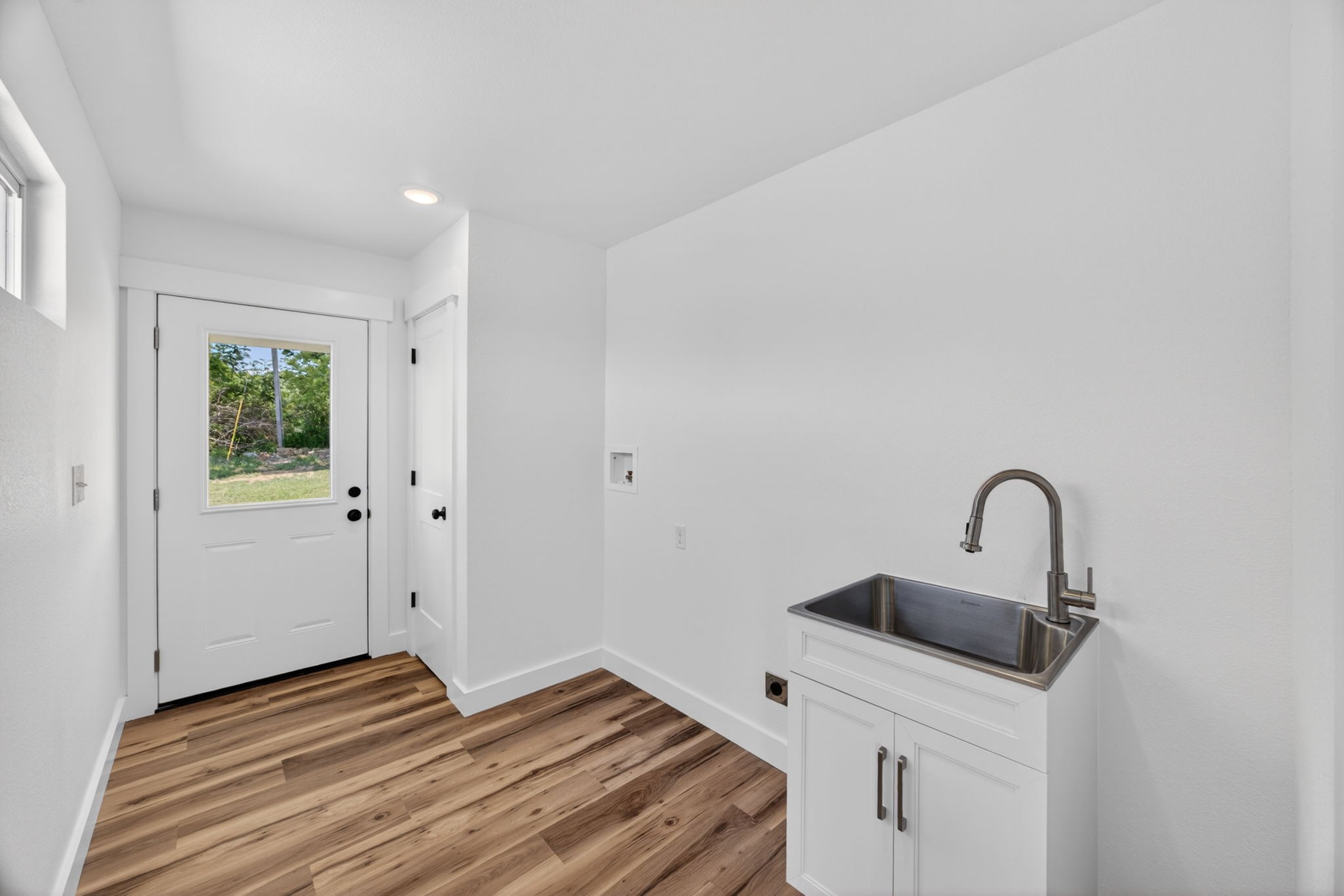 116 Bill Storie Road Byrdstown, TN 38549 - Photo 18 of 32 a bedroom with a sink and a mirror