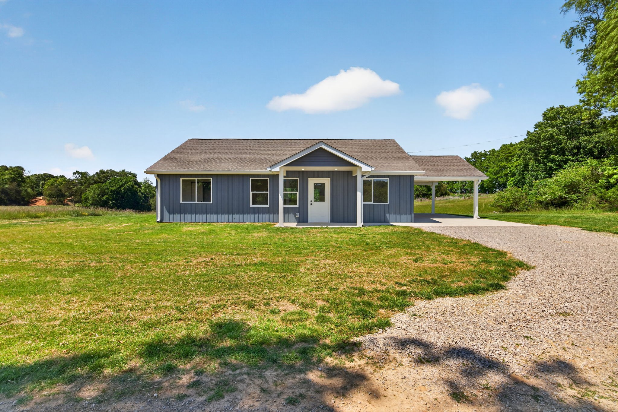 116 Bill Storie Road Byrdstown, TN 38549 - Photo 2 of 32 a front view of a house with a garden